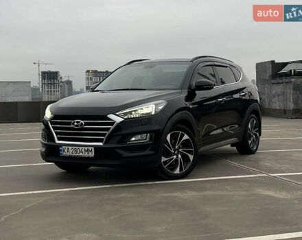 Черный Хендай Туксон, объемом двигателя 2 л и пробегом 145 тыс. км за 23900 $, фото 1 на Automoto.ua