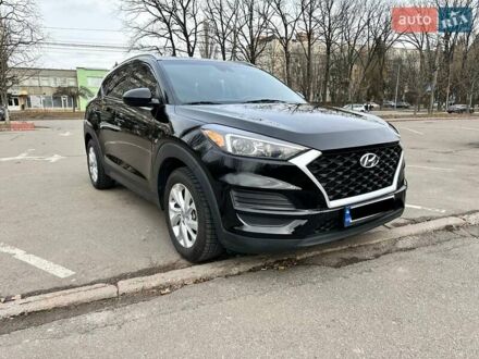 Черный Хендай Туксон, объемом двигателя 2 л и пробегом 98 тыс. км за 18500 $, фото 1 на Automoto.ua