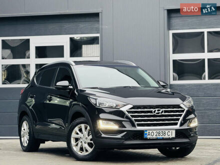 Черный Хендай Туксон, объемом двигателя 2 л и пробегом 84 тыс. км за 19000 $, фото 1 на Automoto.ua