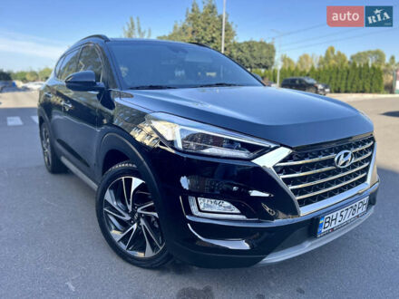 Чорний Хендай Туксон, об'ємом двигуна 2 л та пробігом 130 тис. км за 24400 $, фото 1 на Automoto.ua