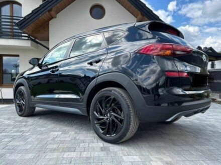 Черный Хендай Туксон, объемом двигателя 1.6 л и пробегом 57 тыс. км за 10100 $, фото 1 на Automoto.ua