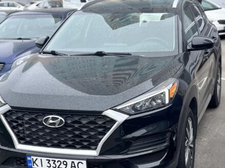 Черный Хендай Туксон, объемом двигателя 2.4 л и пробегом 140 тыс. км за 20000 $, фото 1 на Automoto.ua