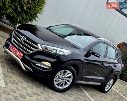 Черный Хендай Туксон, объемом двигателя 2 л и пробегом 151 тыс. км за 18950 $, фото 1 на Automoto.ua