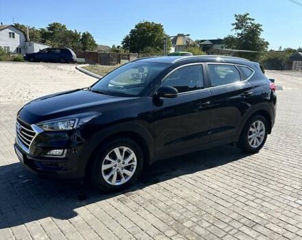 Черный Хендай Туксон, объемом двигателя 2 л и пробегом 76 тыс. км за 22000 $, фото 1 на Automoto.ua