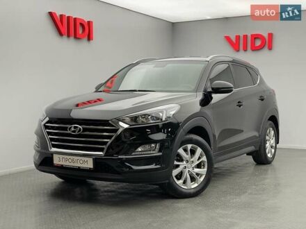 Черный Хендай Туксон, объемом двигателя 2 л и пробегом 100 тыс. км за 22424 $, фото 1 на Automoto.ua