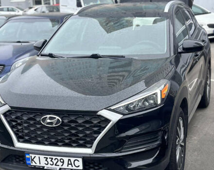 Черный Хендай Туксон, объемом двигателя 2.4 л и пробегом 140 тыс. км за 19500 $, фото 1 на Automoto.ua