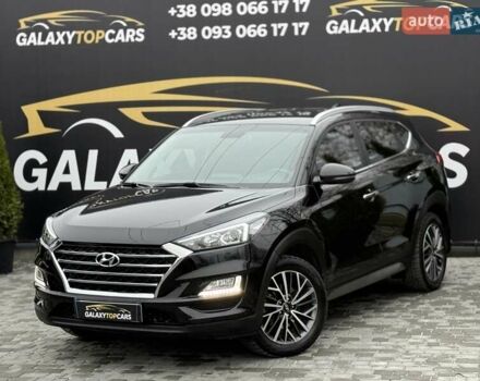 Черный Хендай Туксон, объемом двигателя 2 л и пробегом 55 тыс. км за 22300 $, фото 1 на Automoto.ua