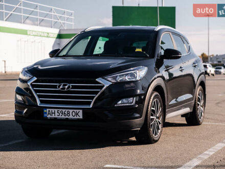 Черный Хендай Туксон, объемом двигателя 2 л и пробегом 88 тыс. км за 23000 $, фото 1 на Automoto.ua