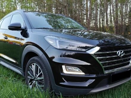 Черный Хендай Туксон, объемом двигателя 2.4 л и пробегом 69 тыс. км за 9600 $, фото 1 на Automoto.ua