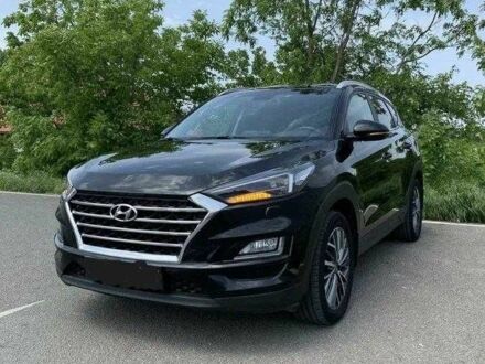 Черный Хендай Туксон, объемом двигателя 2 л и пробегом 129 тыс. км за 16500 $, фото 1 на Automoto.ua