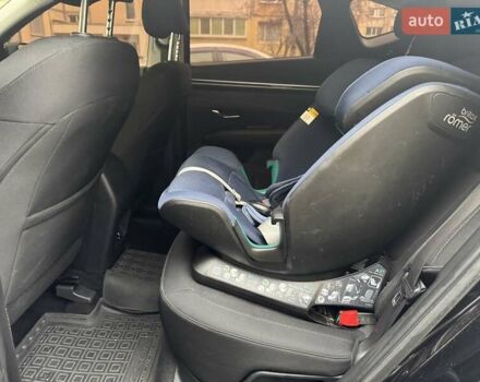 Черный Хендай Туксон, объемом двигателя 2 л и пробегом 131 тыс. км за 23500 $, фото 1 на Automoto.ua