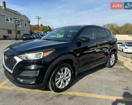 Черный Хендай Туксон, объемом двигателя 2 л и пробегом 125 тыс. км за 4300 $, фото 1 на Automoto.ua