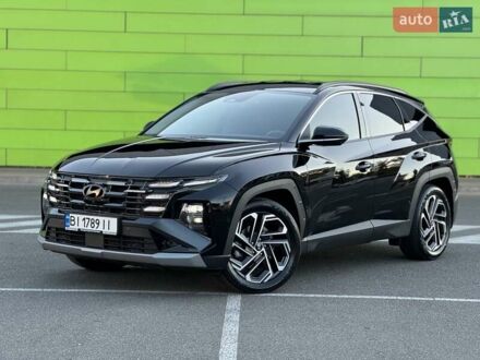 Черный Хендай Туксон, объемом двигателя 2 л и пробегом 55 тыс. км за 33900 $, фото 1 на Automoto.ua
