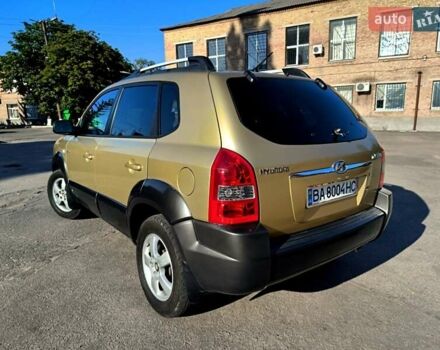 Коричневый Хендай Туксон, объемом двигателя 2 л и пробегом 137 тыс. км за 7500 $, фото 5 на Automoto.ua