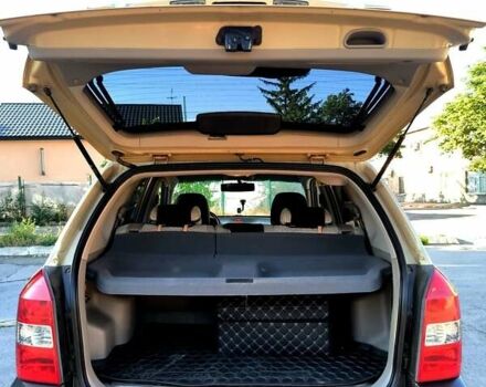 Коричневый Хендай Туксон, объемом двигателя 2 л и пробегом 137 тыс. км за 7500 $, фото 15 на Automoto.ua