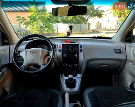 Коричневый Хендай Туксон, объемом двигателя 2 л и пробегом 137 тыс. км за 7500 $, фото 13 на Automoto.ua