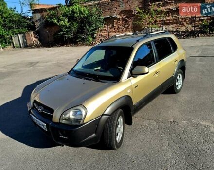 Коричневый Хендай Туксон, объемом двигателя 2 л и пробегом 137 тыс. км за 7500 $, фото 7 на Automoto.ua