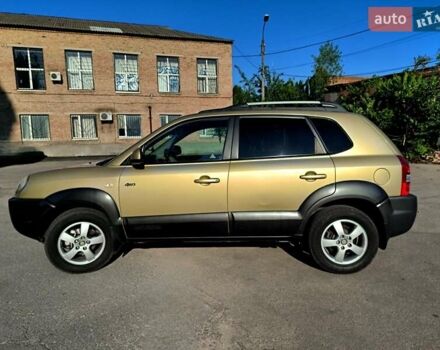 Коричневый Хендай Туксон, объемом двигателя 2 л и пробегом 137 тыс. км за 7500 $, фото 6 на Automoto.ua