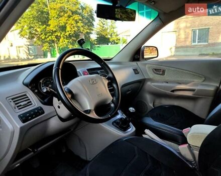 Коричневый Хендай Туксон, объемом двигателя 2 л и пробегом 137 тыс. км за 7500 $, фото 8 на Automoto.ua