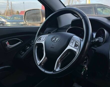 Коричневый Хендай Туксон, объемом двигателя 2.4 л и пробегом 170 тыс. км за 10700 $, фото 15 на Automoto.ua