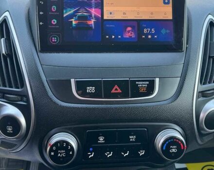 Коричневый Хендай Туксон, объемом двигателя 2.4 л и пробегом 170 тыс. км за 10700 $, фото 13 на Automoto.ua