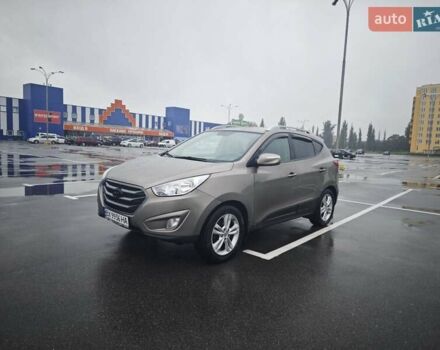 Коричневый Хендай Туксон, объемом двигателя 2.4 л и пробегом 148 тыс. км за 11700 $, фото 1 на Automoto.ua