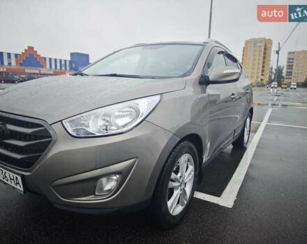 Коричневый Хендай Туксон, объемом двигателя 2.4 л и пробегом 148 тыс. км за 11700 $, фото 11 на Automoto.ua