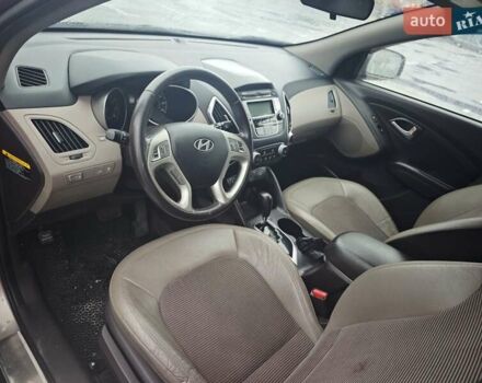 Коричневый Хендай Туксон, объемом двигателя 2.4 л и пробегом 148 тыс. км за 11700 $, фото 19 на Automoto.ua