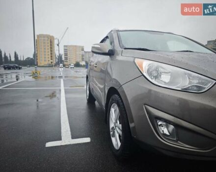 Коричневый Хендай Туксон, объемом двигателя 2.4 л и пробегом 148 тыс. км за 11700 $, фото 12 на Automoto.ua