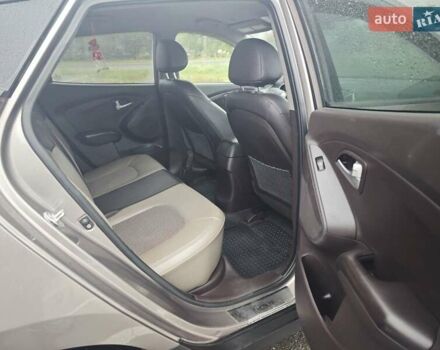 Коричневый Хендай Туксон, объемом двигателя 2.4 л и пробегом 148 тыс. км за 11700 $, фото 23 на Automoto.ua