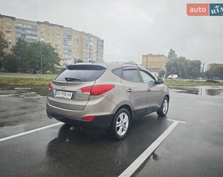 Коричневый Хендай Туксон, объемом двигателя 2.4 л и пробегом 148 тыс. км за 11700 $, фото 9 на Automoto.ua