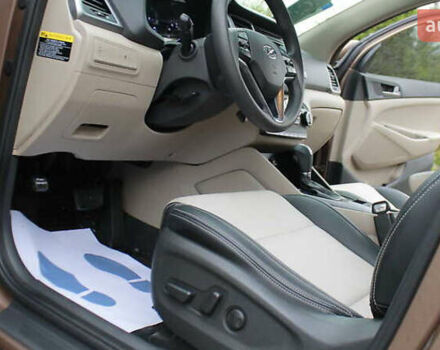 Коричневый Хендай Туксон, объемом двигателя 1.59 л и пробегом 127 тыс. км за 14400 $, фото 3 на Automoto.ua