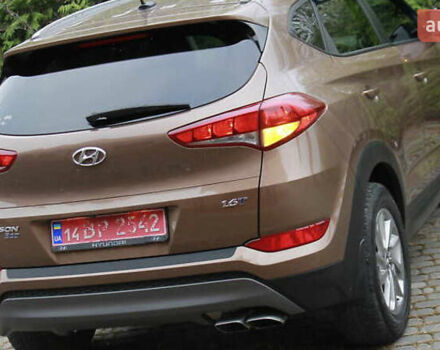 Коричневый Хендай Туксон, объемом двигателя 1.59 л и пробегом 127 тыс. км за 14400 $, фото 22 на Automoto.ua