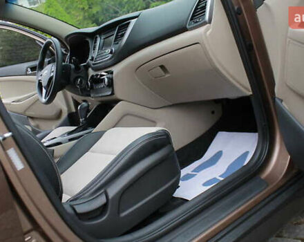 Коричневый Хендай Туксон, объемом двигателя 1.59 л и пробегом 127 тыс. км за 14400 $, фото 15 на Automoto.ua