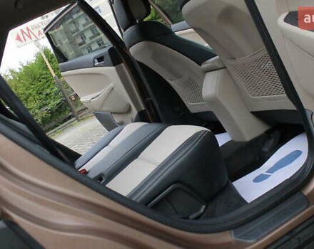 Коричневый Хендай Туксон, объемом двигателя 1.59 л и пробегом 127 тыс. км за 14400 $, фото 16 на Automoto.ua