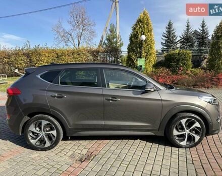 Коричневый Хендай Туксон, объемом двигателя 2 л и пробегом 100 тыс. км за 23500 $, фото 8 на Automoto.ua