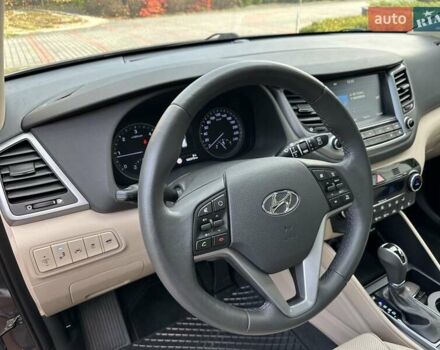 Коричневый Хендай Туксон, объемом двигателя 2 л и пробегом 100 тыс. км за 23500 $, фото 27 на Automoto.ua