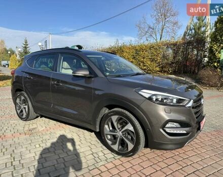 Коричневый Хендай Туксон, объемом двигателя 2 л и пробегом 100 тыс. км за 23500 $, фото 7 на Automoto.ua