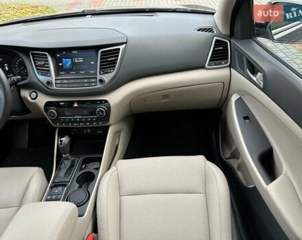 Коричневый Хендай Туксон, объемом двигателя 2 л и пробегом 100 тыс. км за 23500 $, фото 29 на Automoto.ua