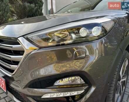 Коричневый Хендай Туксон, объемом двигателя 2 л и пробегом 100 тыс. км за 23500 $, фото 90 на Automoto.ua