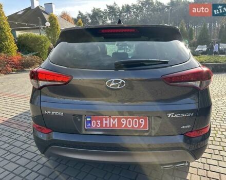 Коричневый Хендай Туксон, объемом двигателя 2 л и пробегом 100 тыс. км за 23500 $, фото 11 на Automoto.ua