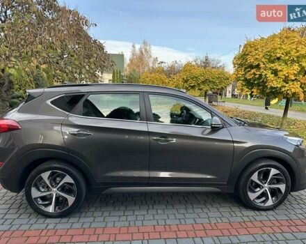 Коричневый Хендай Туксон, объемом двигателя 2 л и пробегом 100 тыс. км за 23500 $, фото 20 на Automoto.ua