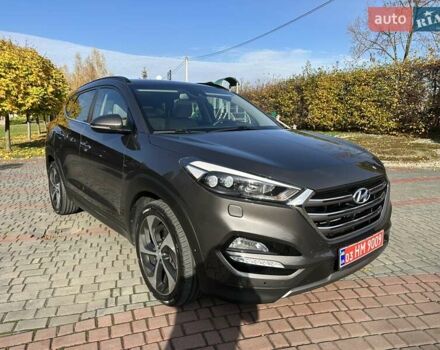Коричневый Хендай Туксон, объемом двигателя 2 л и пробегом 100 тыс. км за 23500 $, фото 6 на Automoto.ua