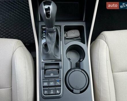 Коричневый Хендай Туксон, объемом двигателя 2 л и пробегом 100 тыс. км за 23500 $, фото 35 на Automoto.ua