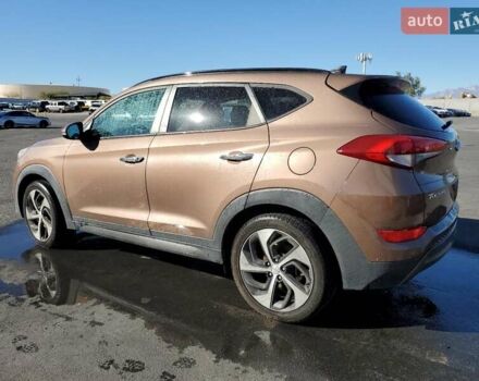 Коричневый Хендай Туксон, объемом двигателя 1.6 л и пробегом 96 тыс. км за 2500 $, фото 1 на Automoto.ua