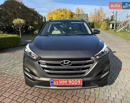 Коричневый Хендай Туксон, объемом двигателя 2 л и пробегом 100 тыс. км за 23500 $, фото 1 на Automoto.ua
