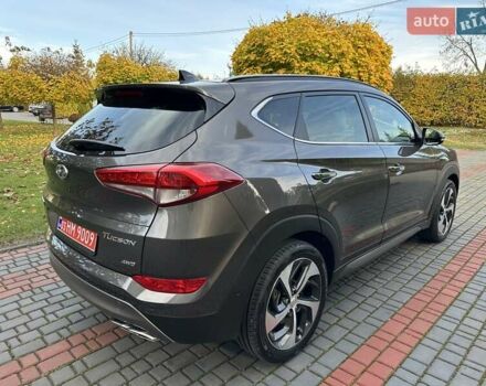Коричневый Хендай Туксон, объемом двигателя 2 л и пробегом 100 тыс. км за 23500 $, фото 21 на Automoto.ua