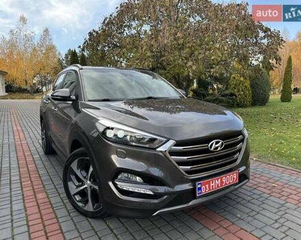 Коричневый Хендай Туксон, объемом двигателя 2 л и пробегом 100 тыс. км за 23500 $, фото 12 на Automoto.ua