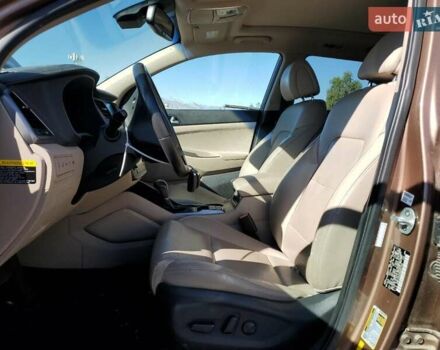 Коричневый Хендай Туксон, объемом двигателя 1.6 л и пробегом 96 тыс. км за 2500 $, фото 6 на Automoto.ua