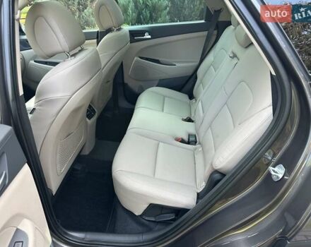 Коричневый Хендай Туксон, объемом двигателя 2 л и пробегом 100 тыс. км за 23500 $, фото 51 на Automoto.ua